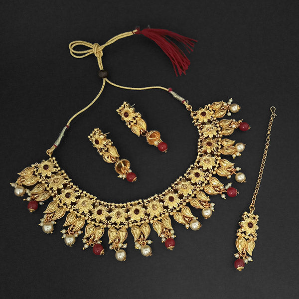 JewelMaze Gold Plated Maroon Austrian Stone Necklace Set With Maang Tikka