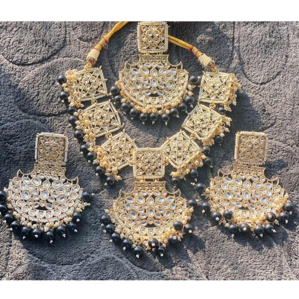 JewelMaze Gold Plated Black Beads & Kundan Necklace Set With Maang Tikka