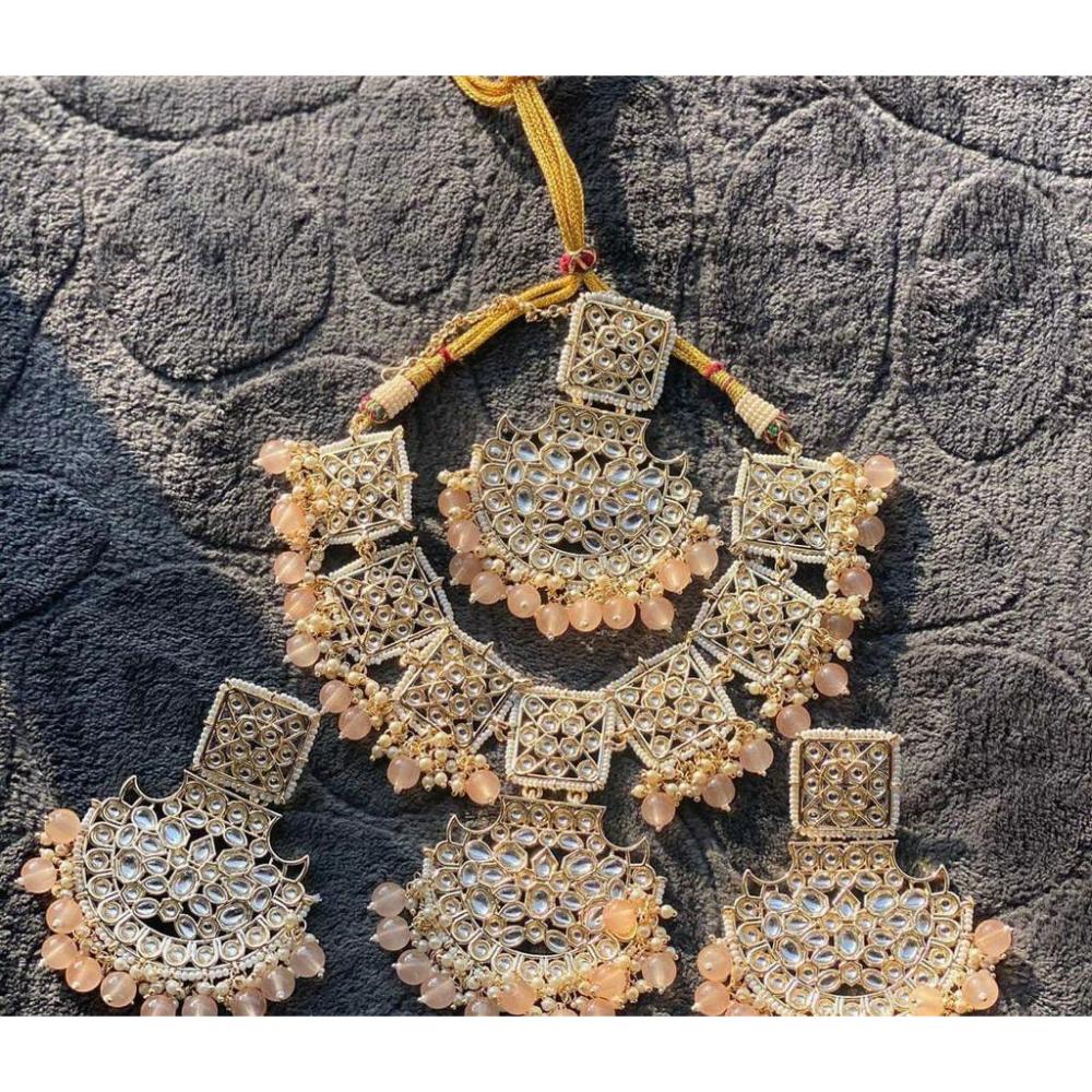 JewelMaze Gold Plated Peach Beads Kundan Necklace Set With Maang Tik