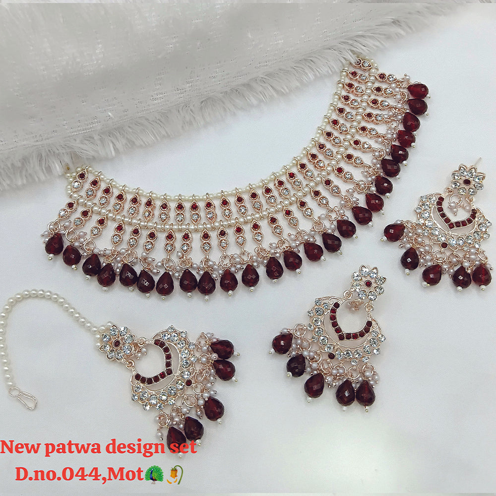 JewelMaze Austrian Stone Choker Necklace Set With Maang Tikka - 11374789