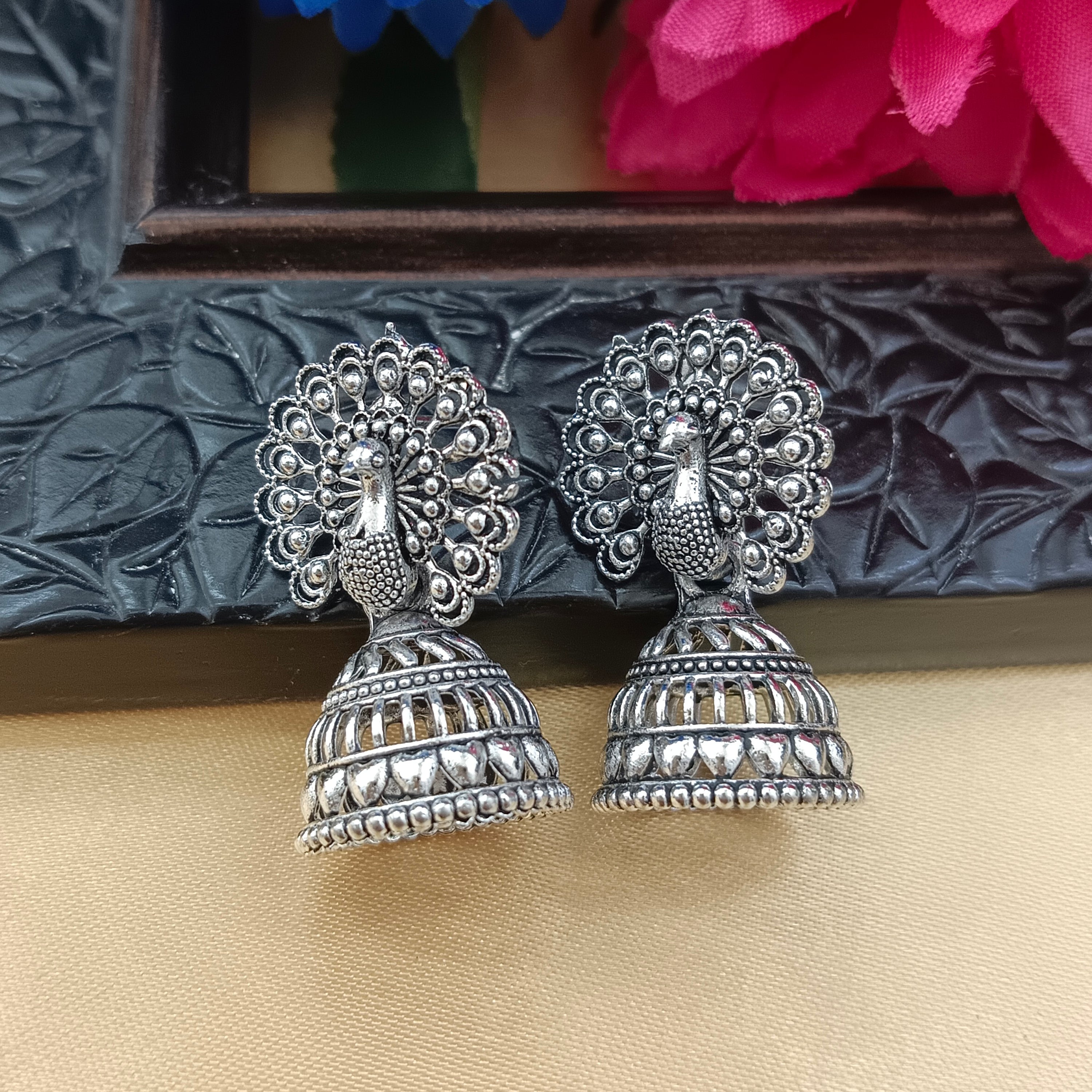 JewelMaze Oxidised Plated Peacock Jhumki Earrings