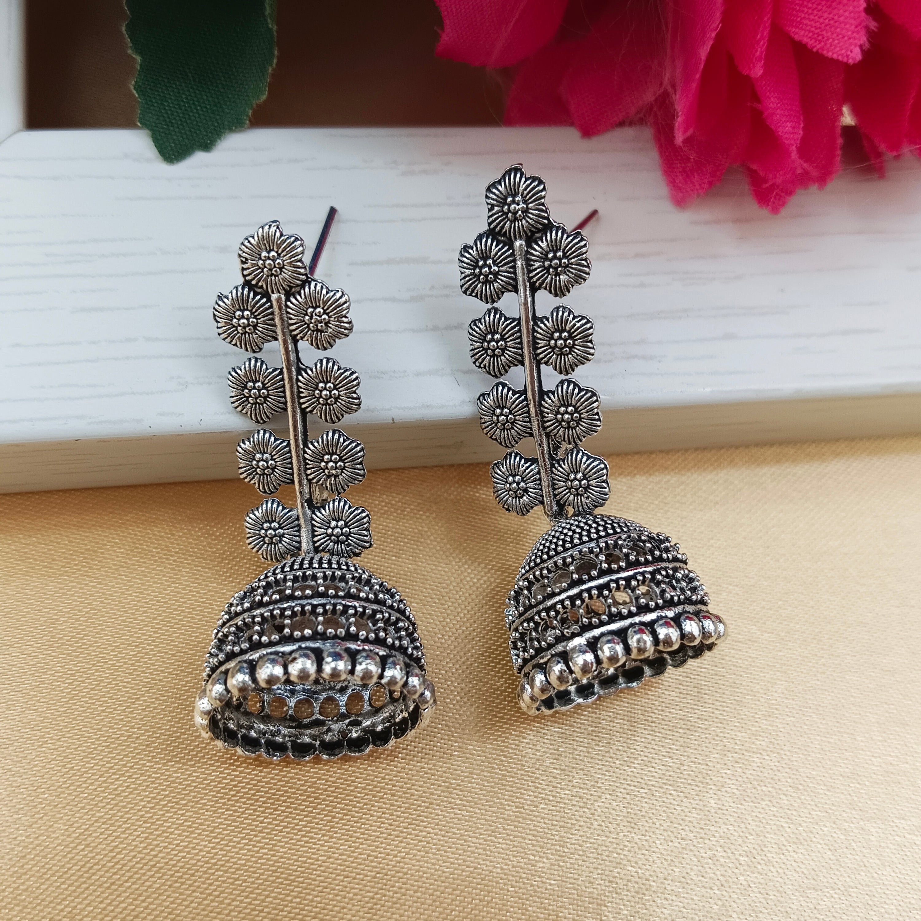 JewelMaze Oxidised Plated Floral Jhumki Earrings