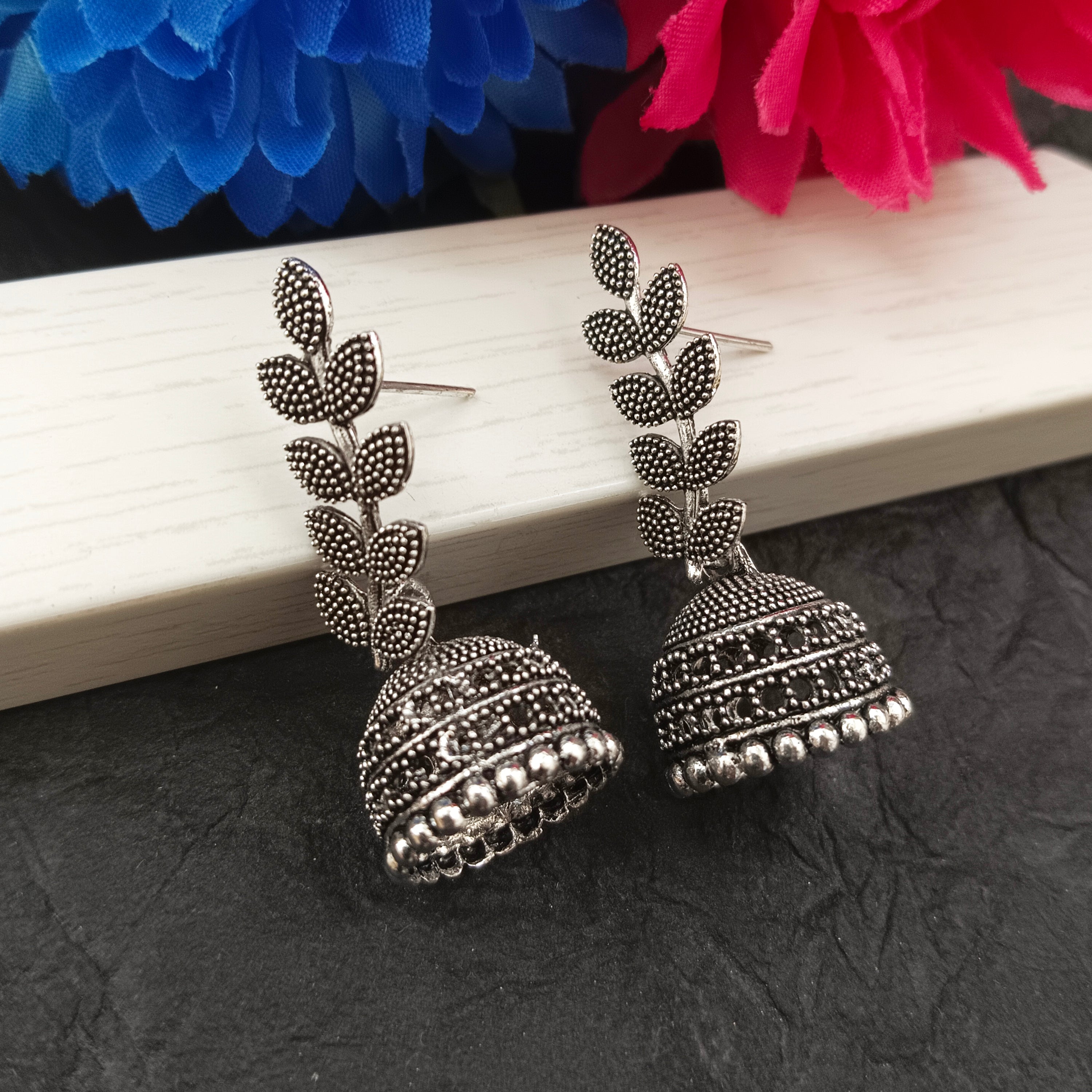 JewelMaze Oxidised Plated Leaves DesignJhumki Earrings