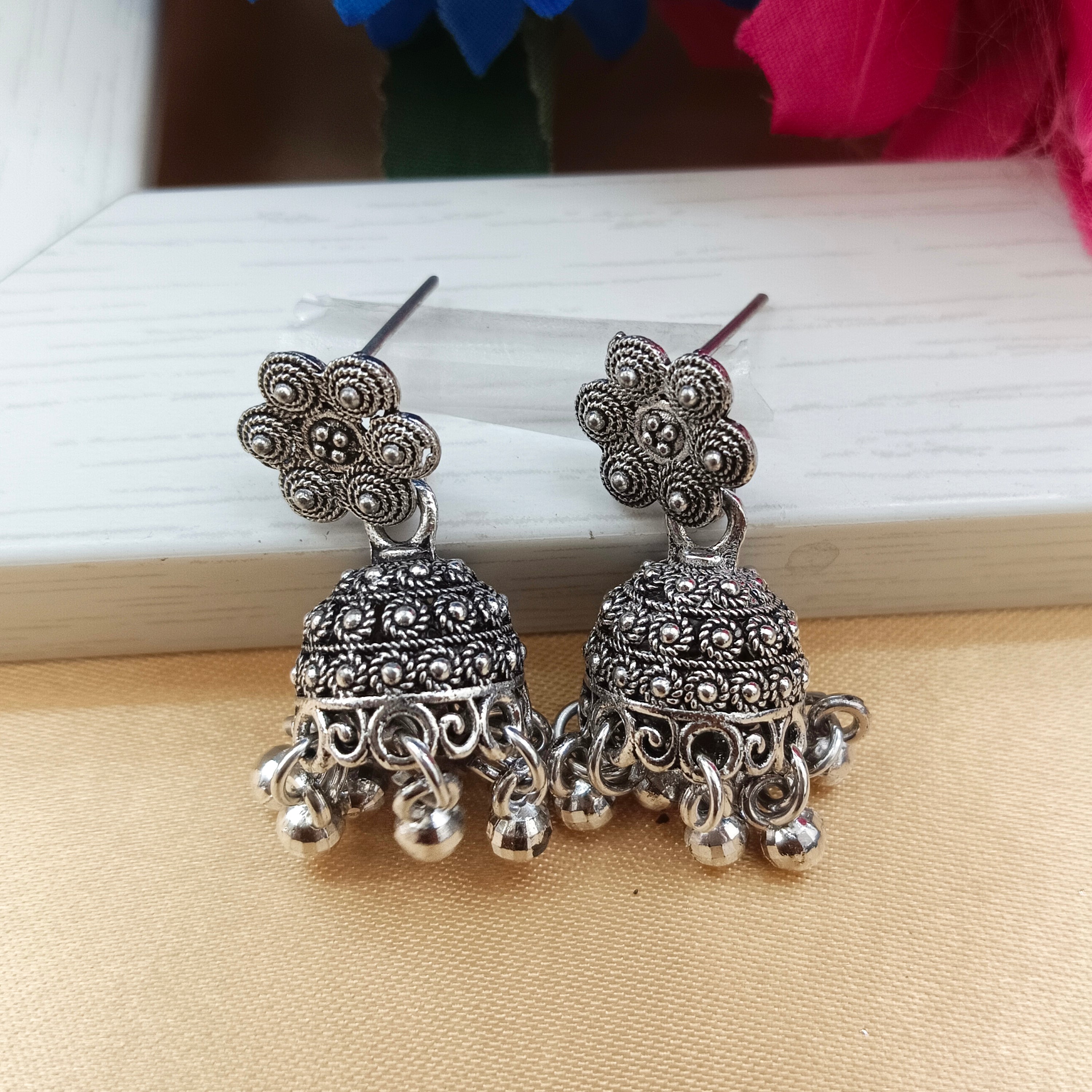 JewelMaze Oxidised Plated Floral Jhumki Earrings