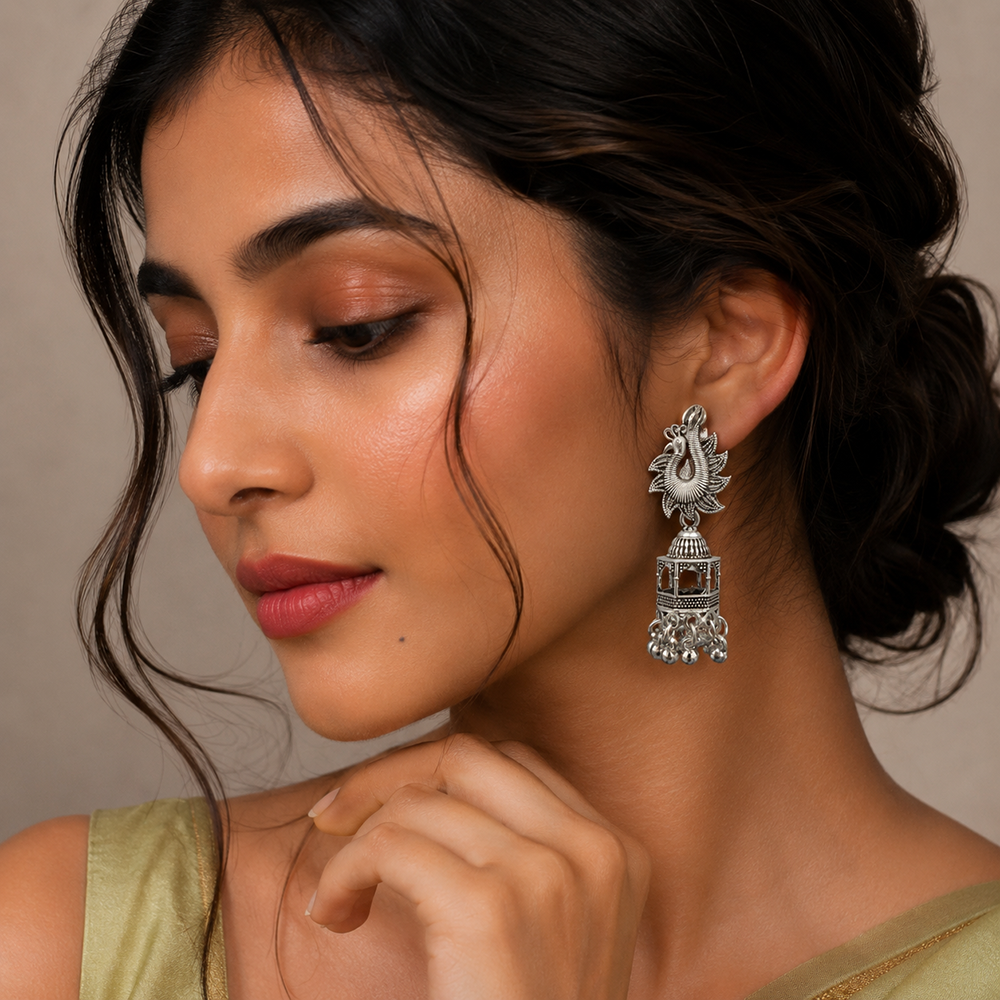 JewelMaze Oxidised Plated Pearl Peacock Jhumki Earrings