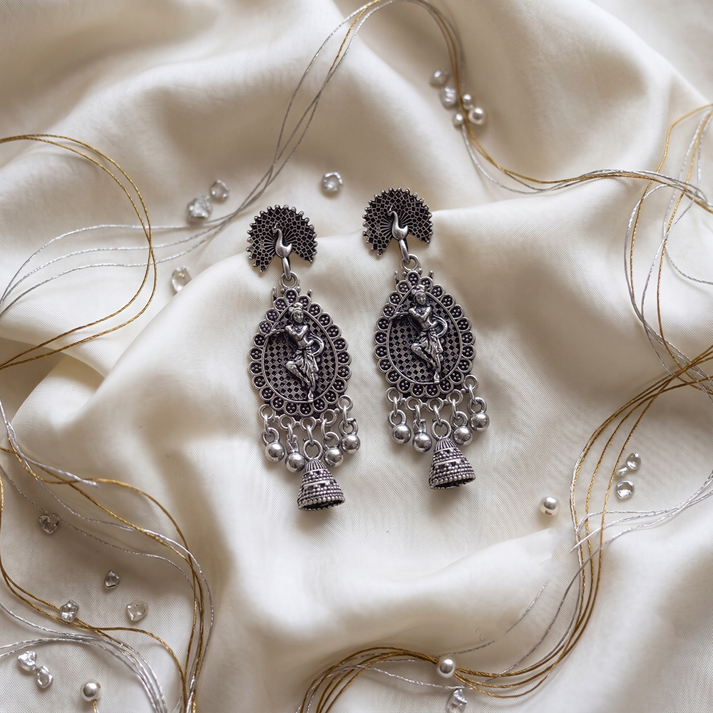 JewelMaze Oxidised Plated Peackock & Tempel Pearl Jhumki Earrings