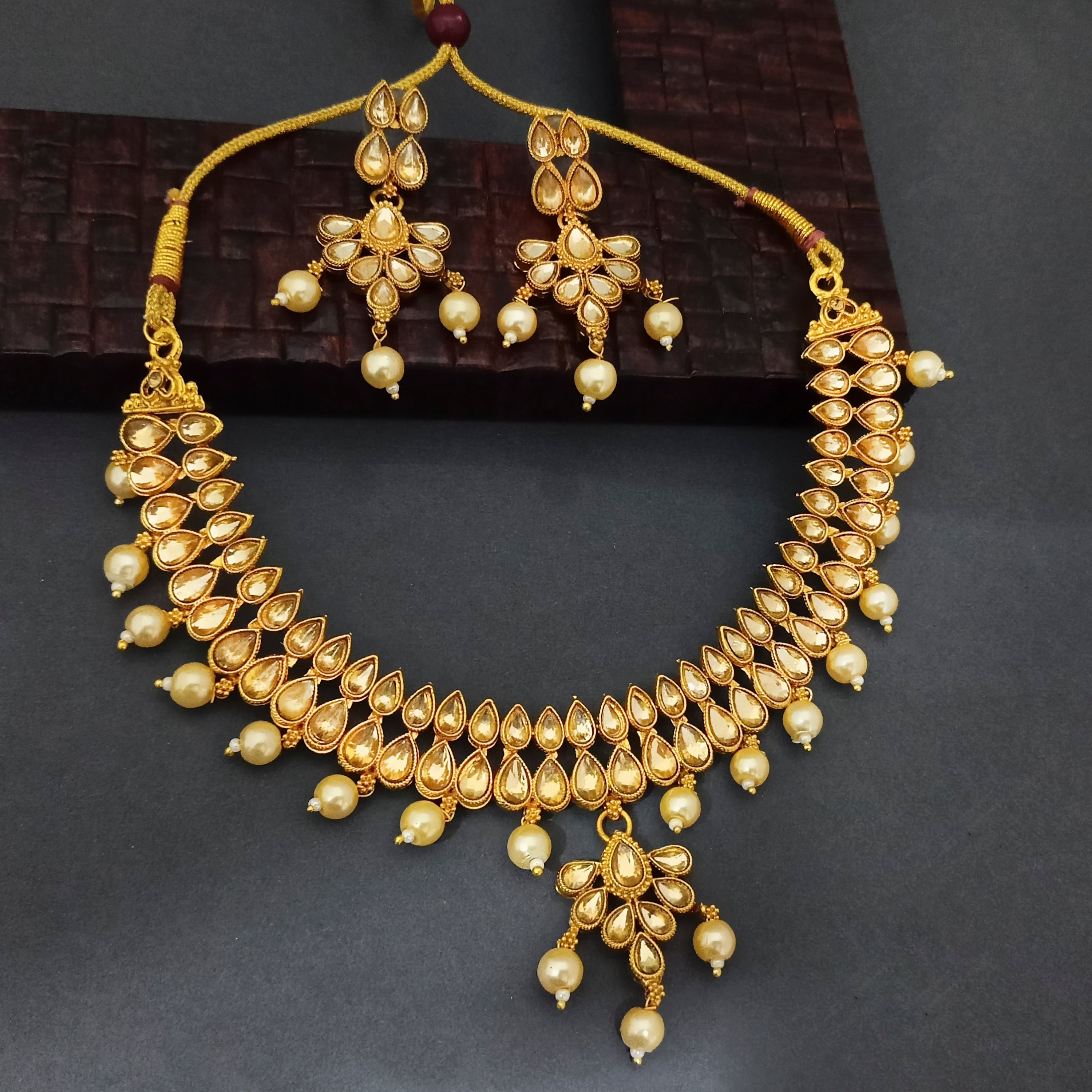 JewelMaze Brown Kundan Stone Gold Plated Traditional Choker Necklace Set