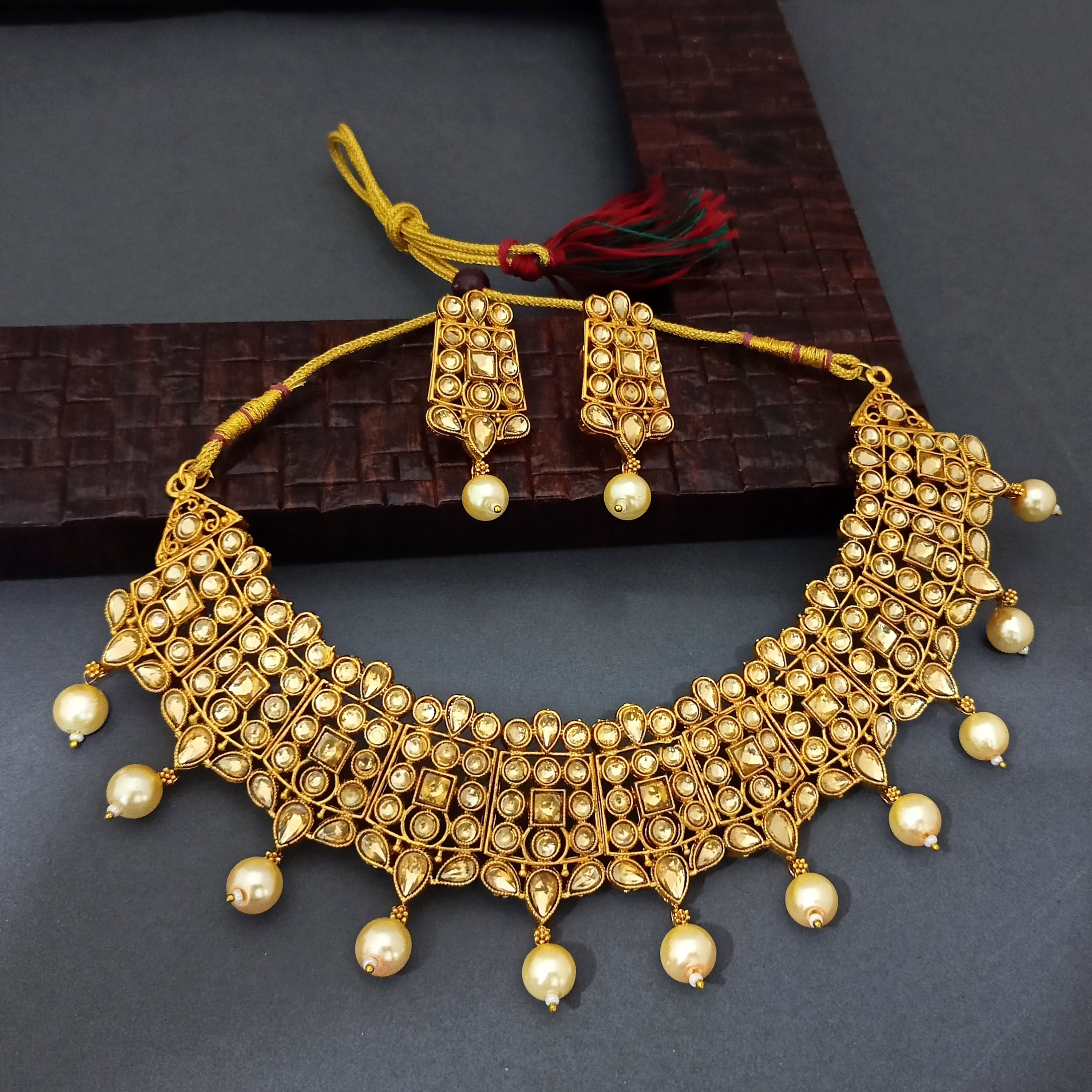JewelMaze Brown Kundan Stone Gold Plated Traditional Choker Necklace Set