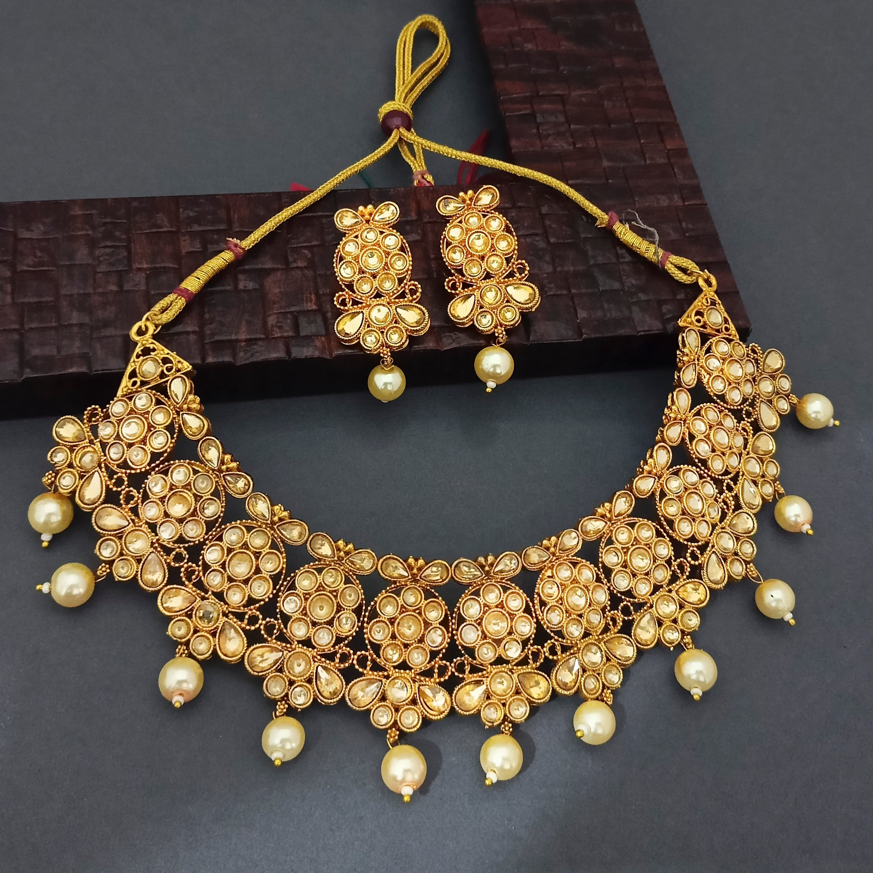 JewelMaze Brown Kundan Stone Gold Plated Traditional Choker Necklace Set