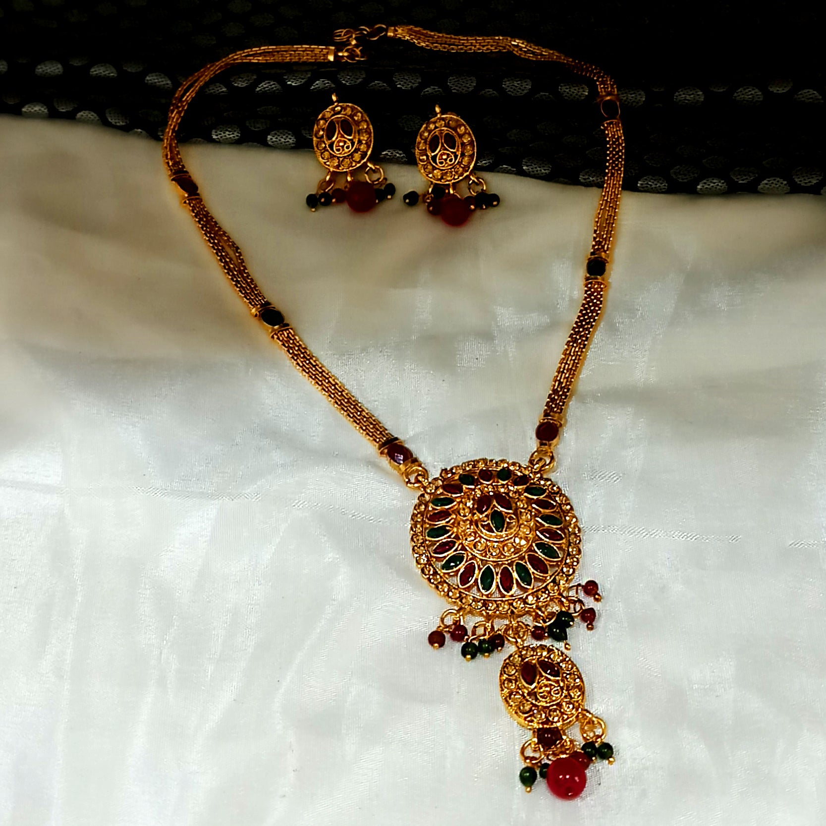 JewelMaze Gold Plated Maroon Austrian Stone Necklace Set