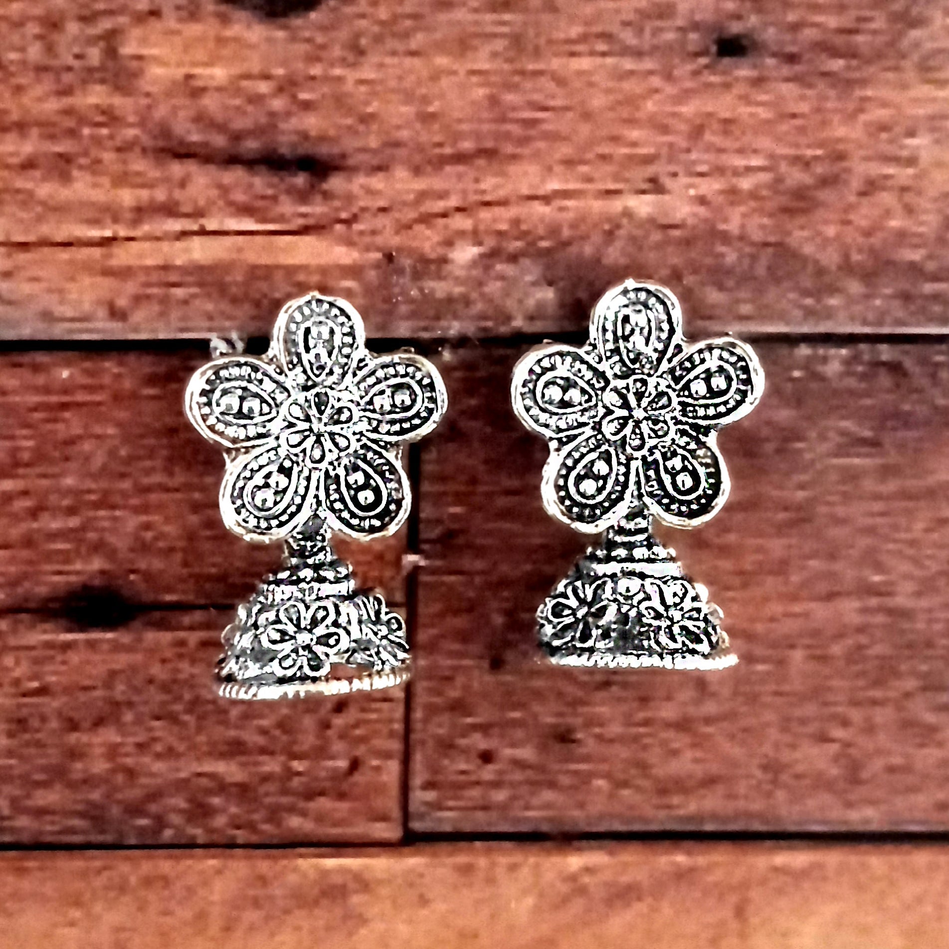 JewelMaze Silver Plated FloralSmall Jhumki Earrings