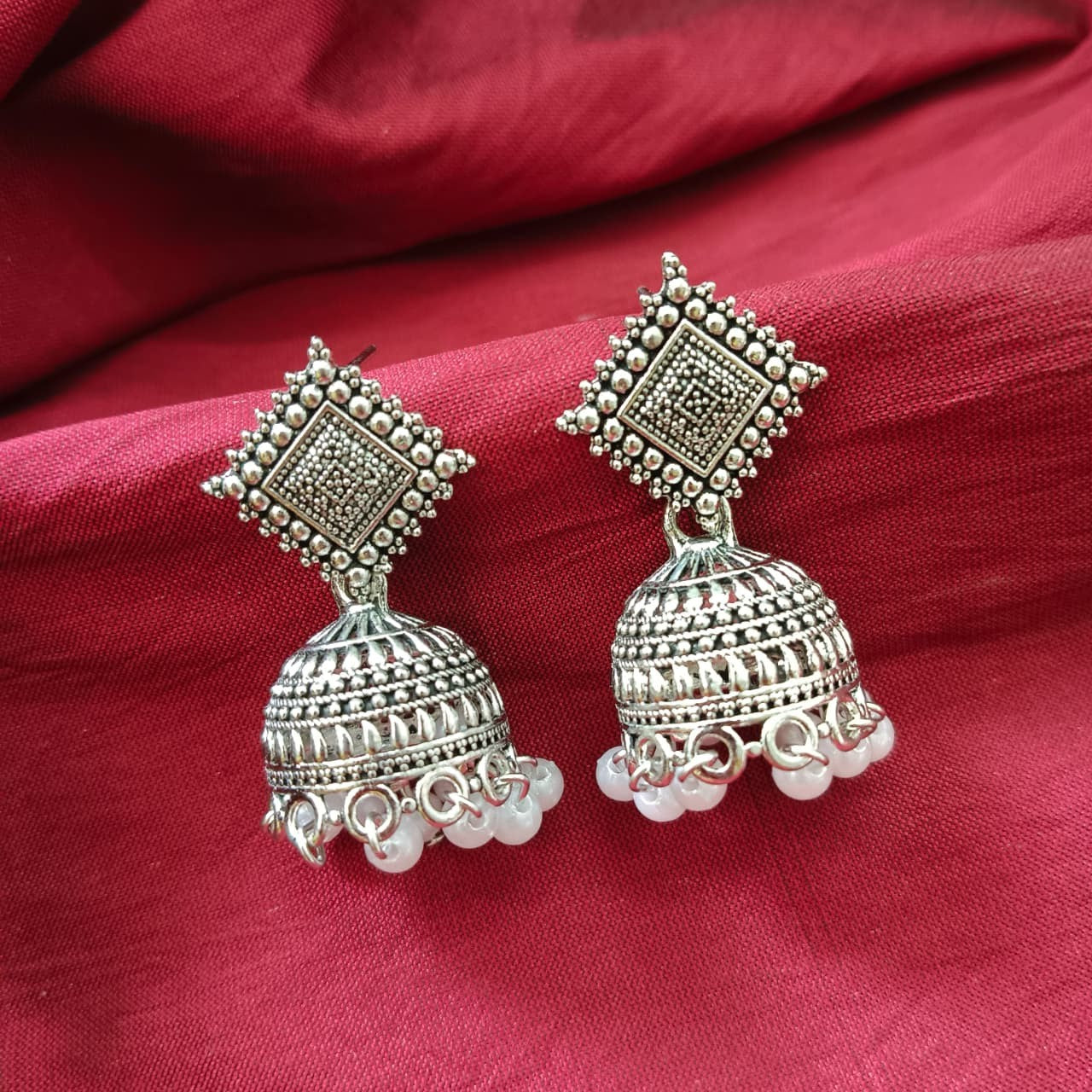 Jewelmaze Oxidised Plated Jhumki Earrings