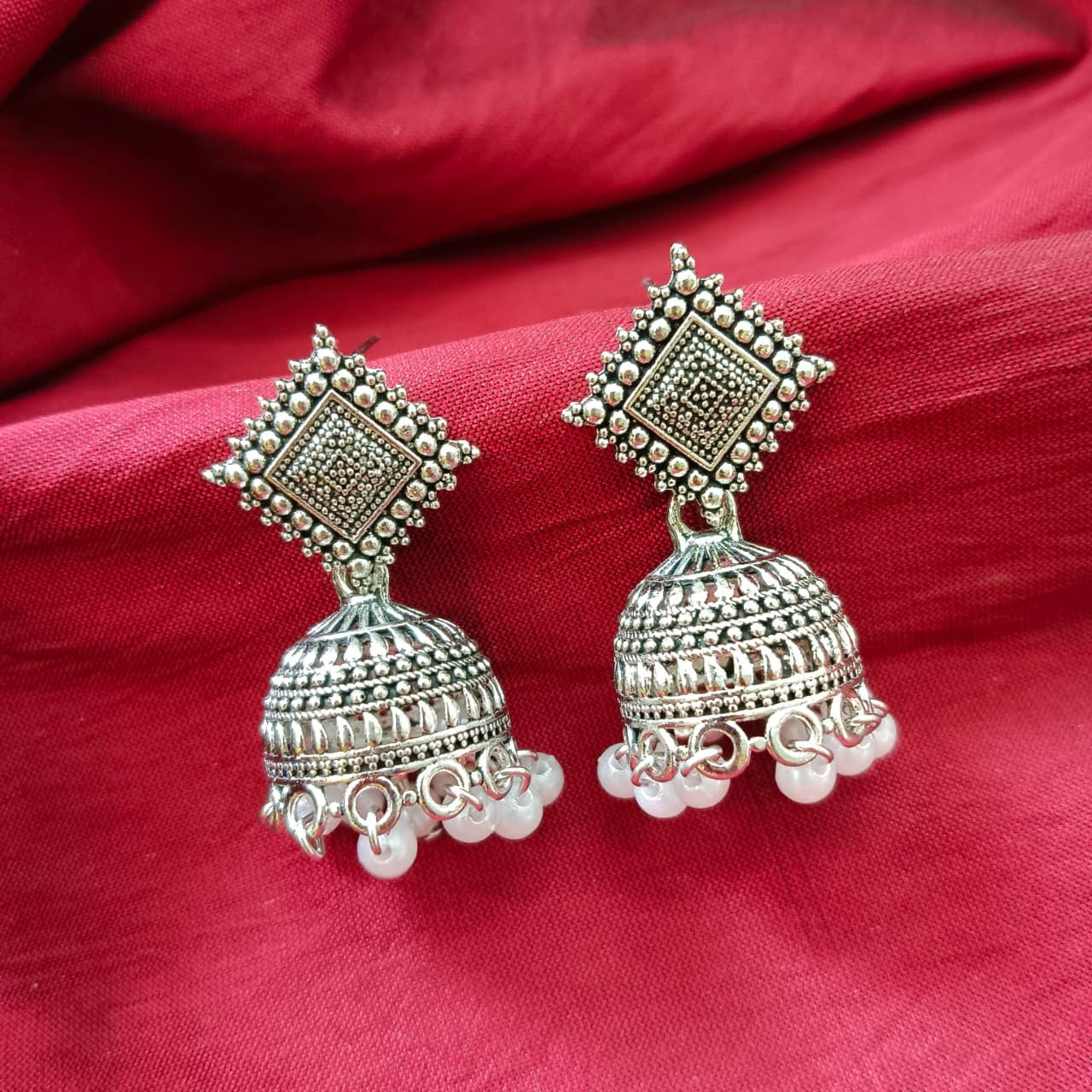 Jewelmaze Oxidised Plated Jhumki Earrings