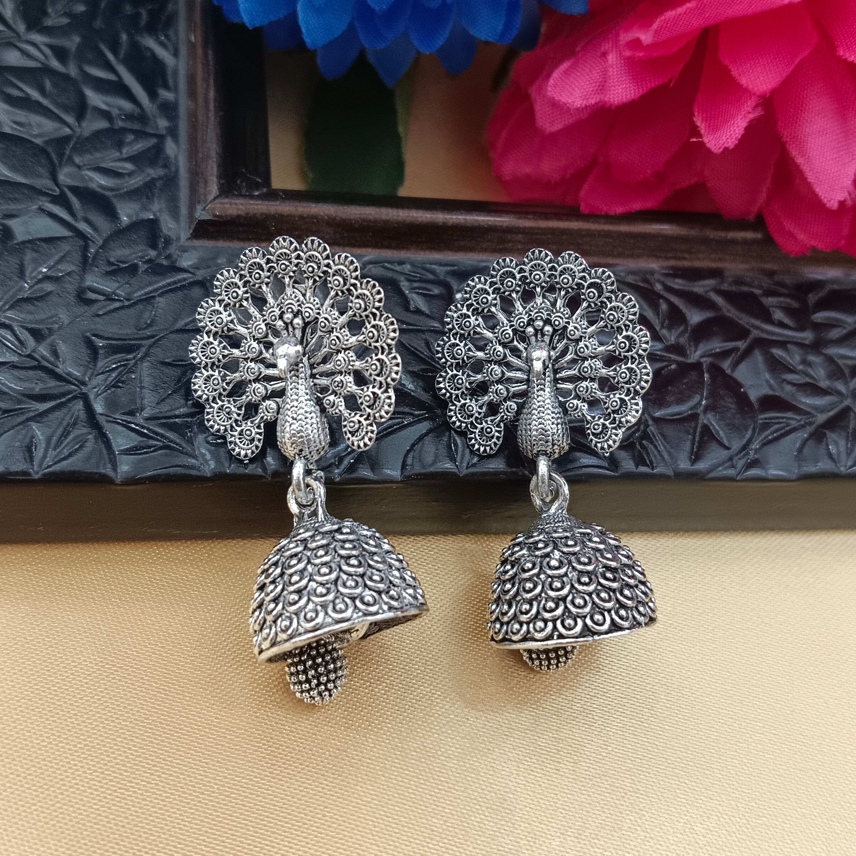 JewelMaze Oxidised Plated Peacock Jhumki Earrings
