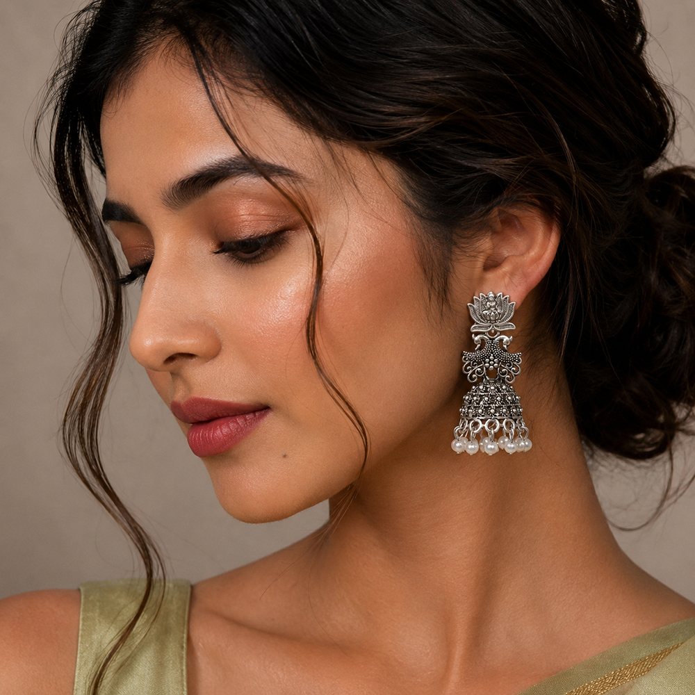 JewelMaze Oxidised Plated Pearl Lotus And Temple Jhumki Earrings