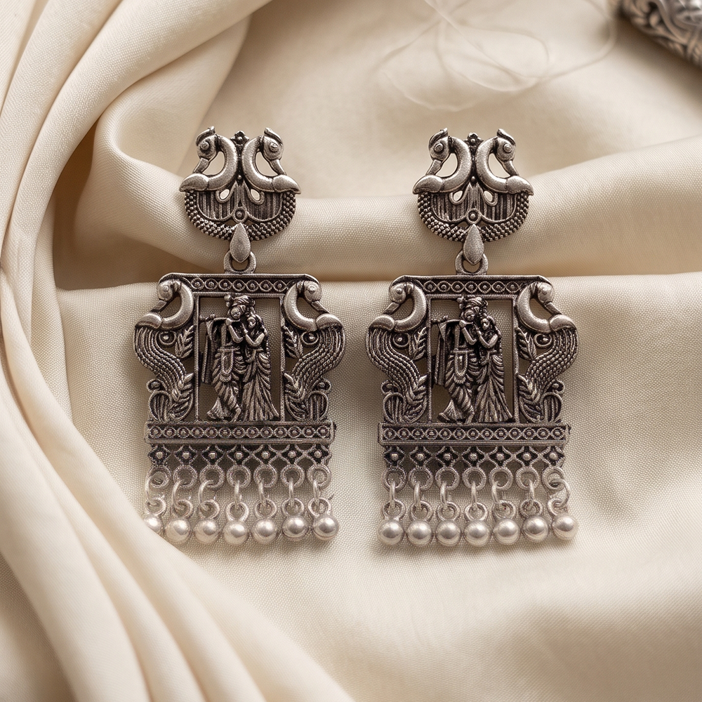 JewelMaze Oxidised Plated Peackock & Tempel Pearl Dangler Earrings 